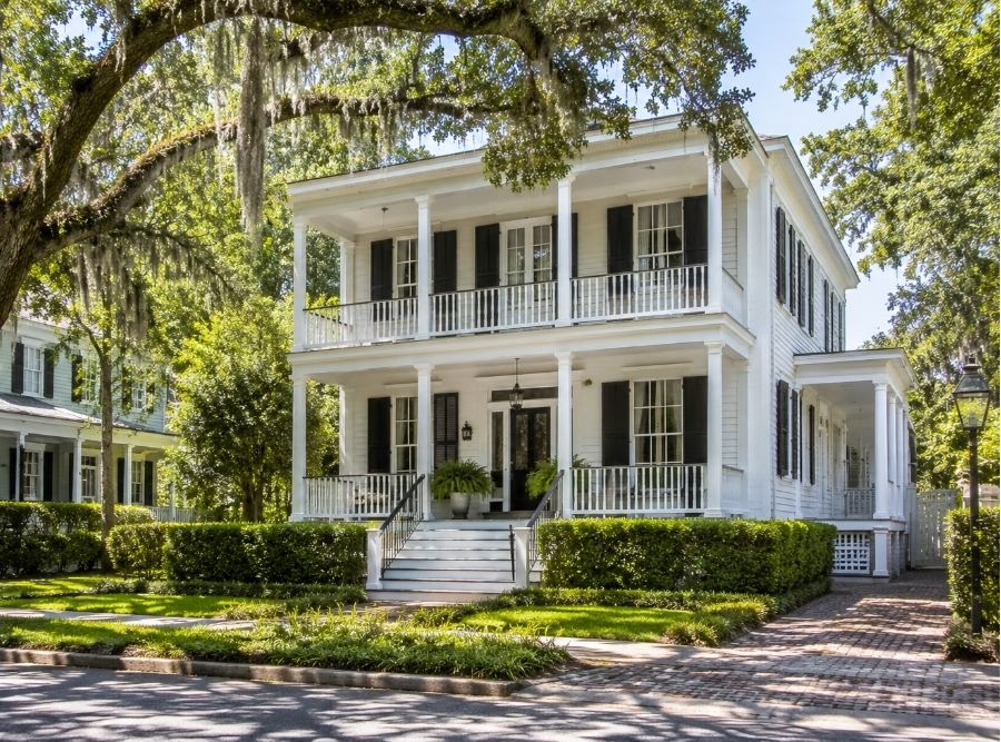 Historic Beaufort, SC Lowcountry home with antebellum architecture, wide front porches, and live oak trees draped in Spanish moss.